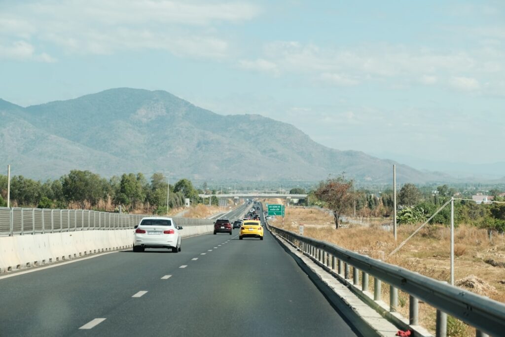 what hybrid car gets the best highway mileage